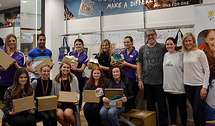 Group of volunteers at TOMS pop up store