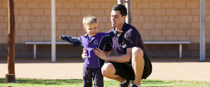 Boy outside with therapist