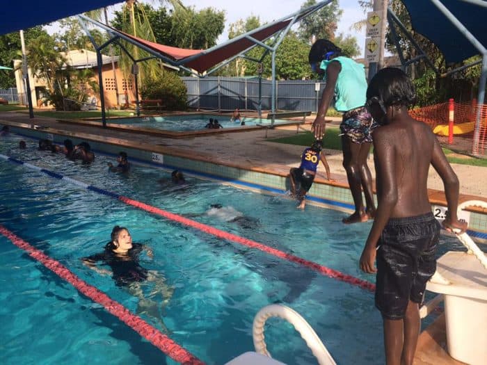 Aboriginal children playing in swimming pool