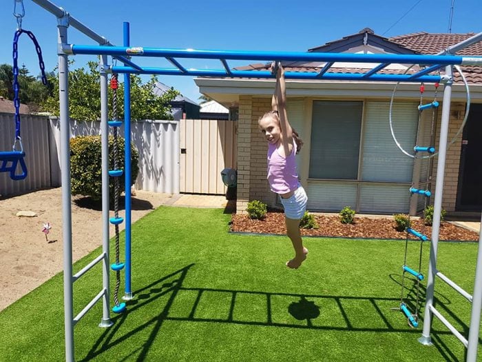 Girl on climbing frame