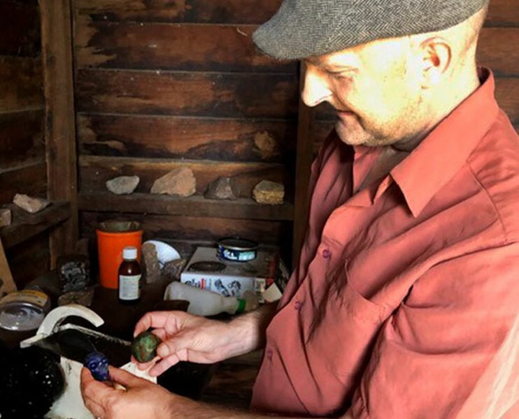 Neil Roper polishing some stones