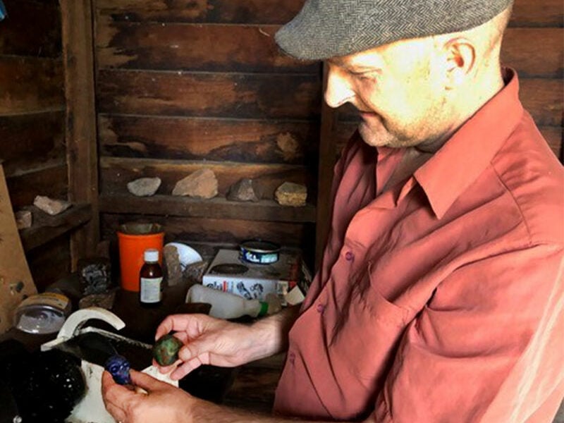 Neil Roper polishing some stones