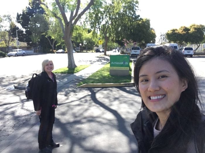 Clinicians Christine Bosch (L) and Su Lin Ng (R) stand outside and take a selfie.
