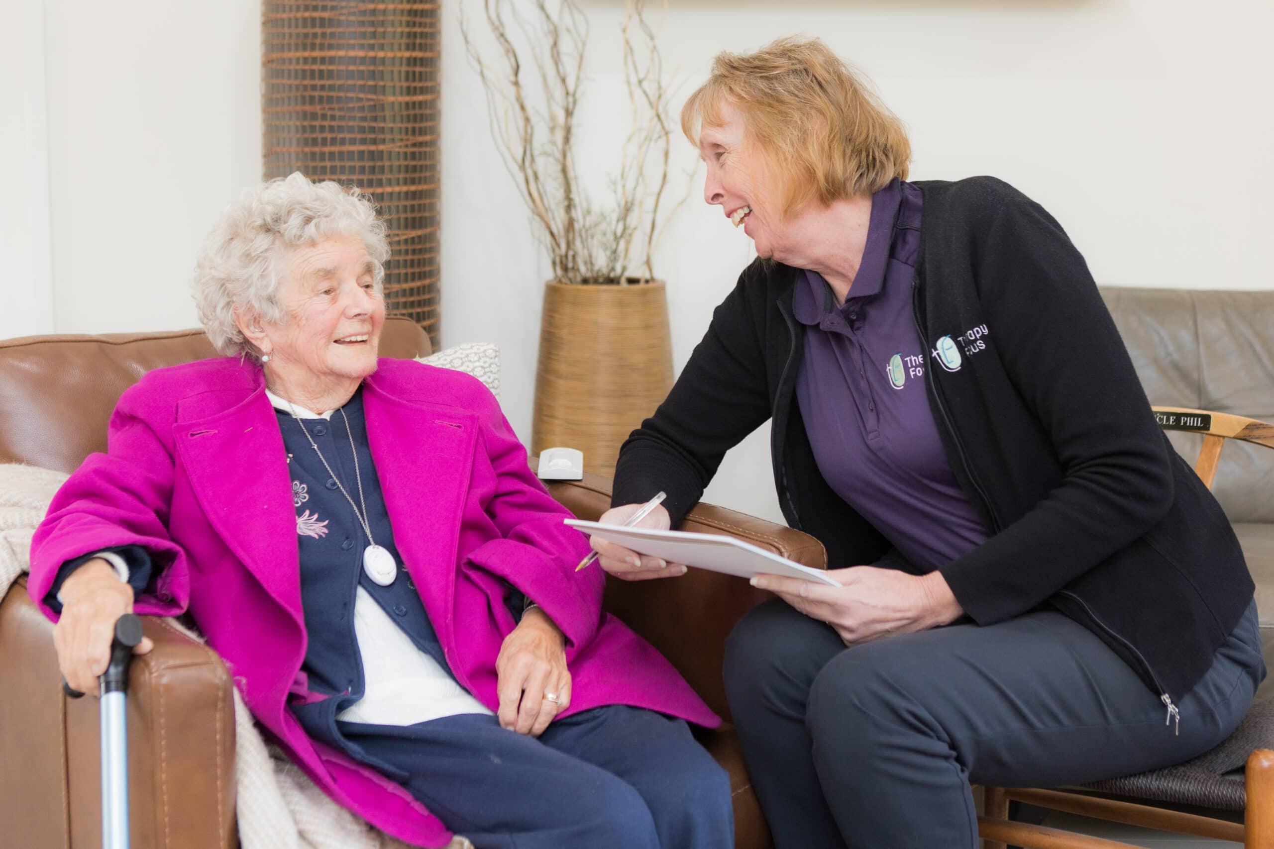 Bladder and Bowel Health Team talks with customer.