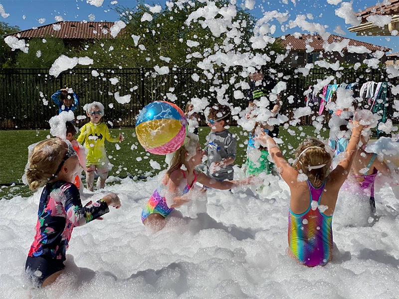 Kids playing in foam