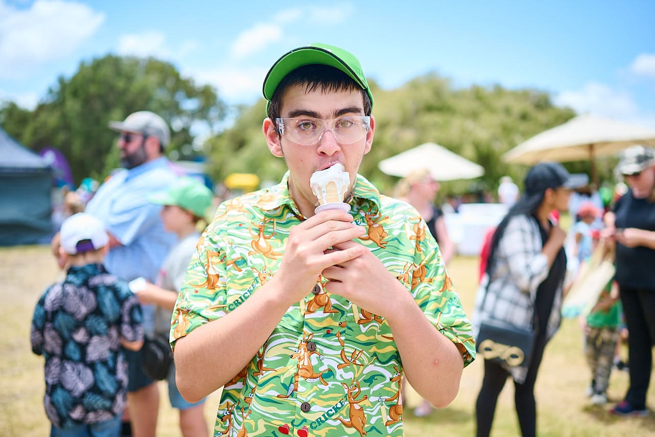A young man enjoying an icecream