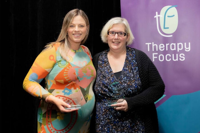 Tessa Harding and Casey Leeden holding their awards